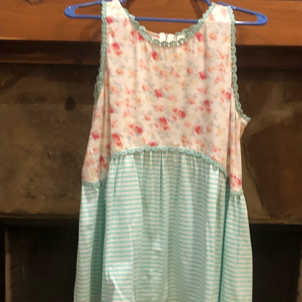 Floral and striped top.